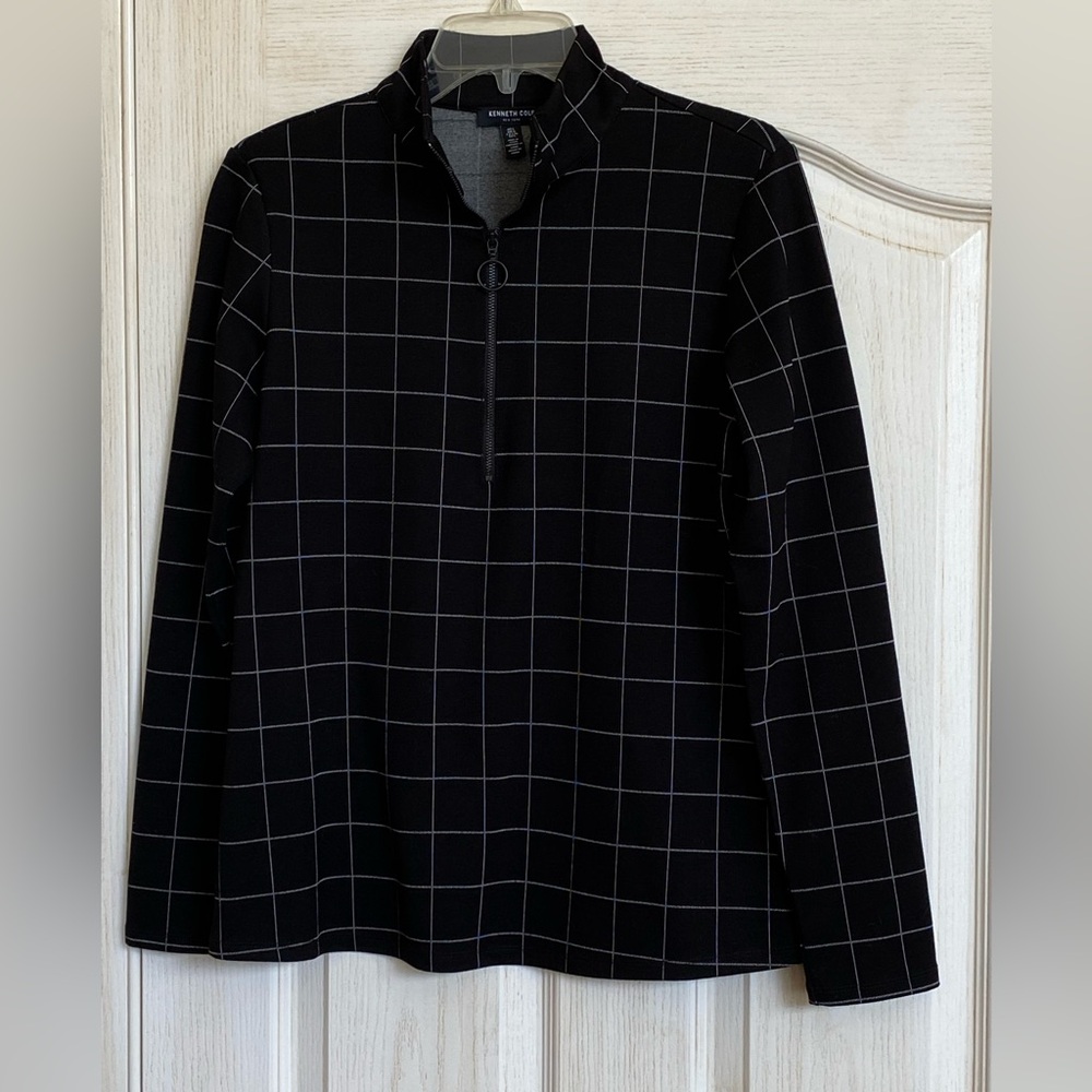 Kenneth Cole half zip pull over top.